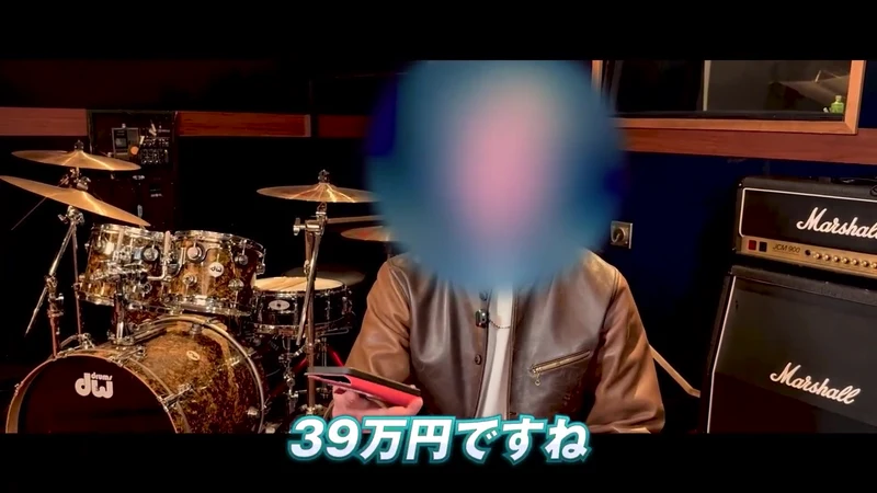 顔にぼかしが入った人物と「39万円ですね」という字幕が映る予告動画